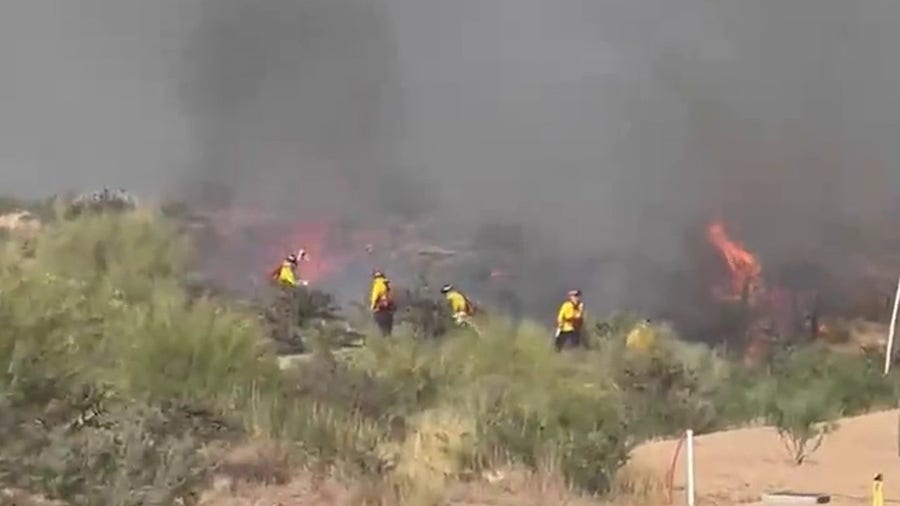Brush fire burns in outskirts of Phoenix
