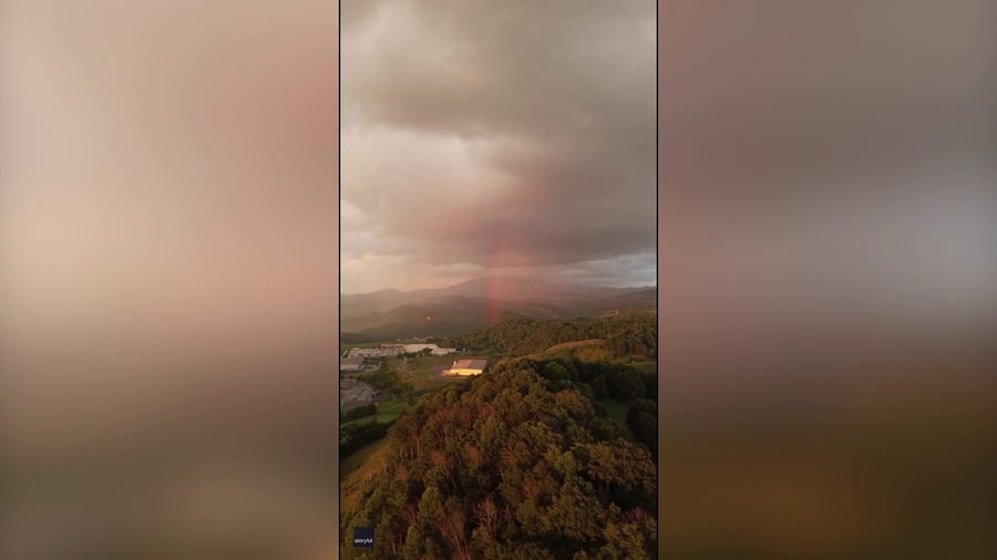 Drone footage shows beautiful rainbow emerging from clouds in Virginia