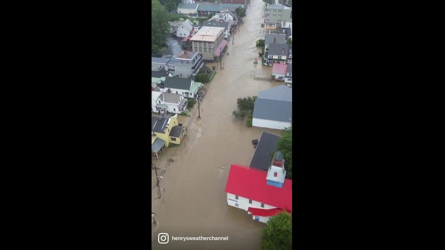 Drone video shows floodwater rushing through Ludlow, Vermont