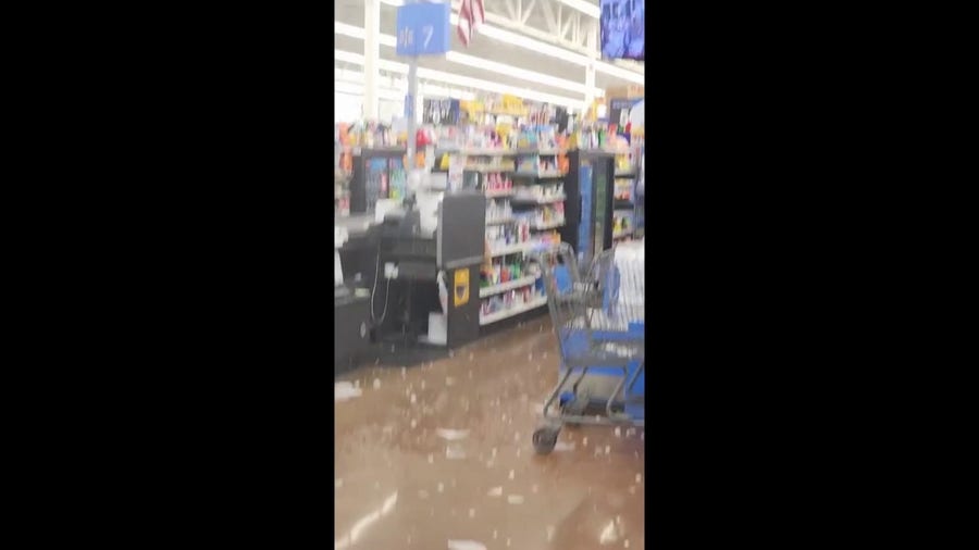 Hail crashes down inside Wisconsin Walmart