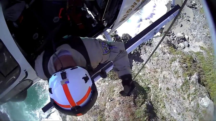 Watch: Woman, dog rescued from California cliff by helicopter