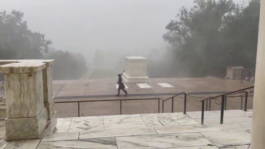 Soldier continues watch over 'Tomb of Unknown Soldier' during severe weather