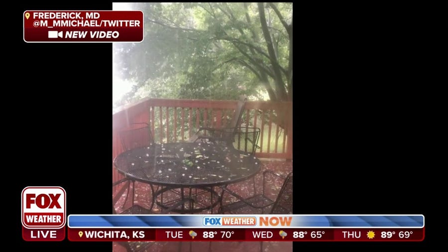 Large hail collecting on Maryland picnic table