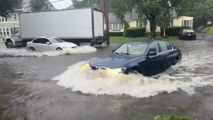 Watch as torrential rain floods roads in Needham, Massachusetts