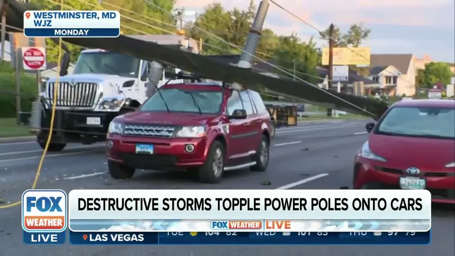 Destructive storms topple power poles onto cars in Maryland