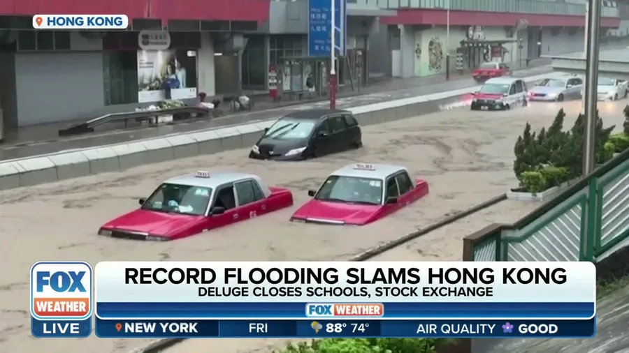 Record flooding slams Hong Kong as deluge closes schools, stock exchange