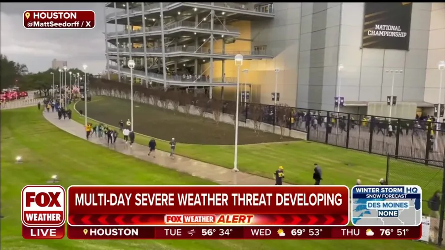 Fans rush to take shelter as storms hit ahead of College Football Playoff National Championship