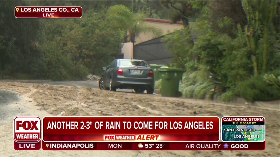 Record rainfall flooding roads, causing mudslides in Los Angeles