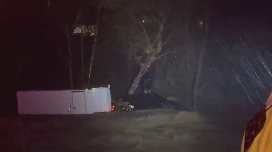 First responders pull three from tree after they escaped submerged car