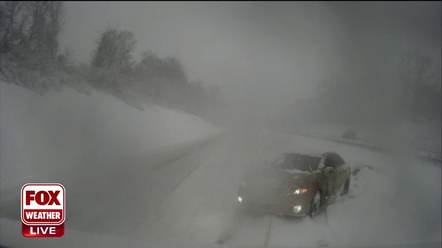 Travel slows in Connecticut as nor'easter covers roads in thick coating of snow