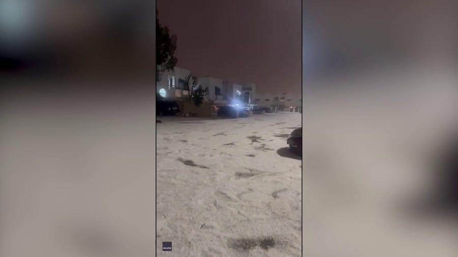Desert residents stunned by rivers of hail in rare UAE weather event