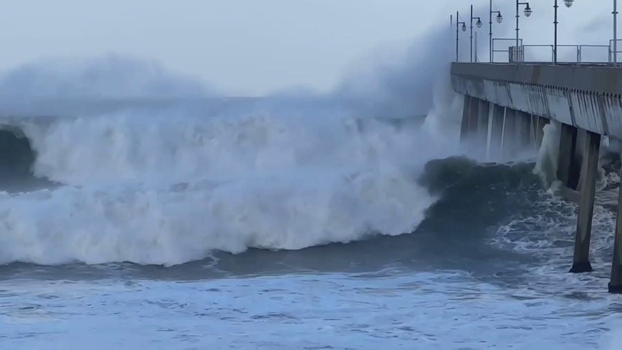 Huge waves pound California pier