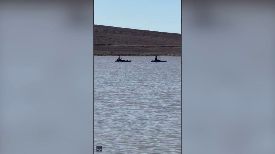 Kayakers take advantage of temporary Death Valley lake