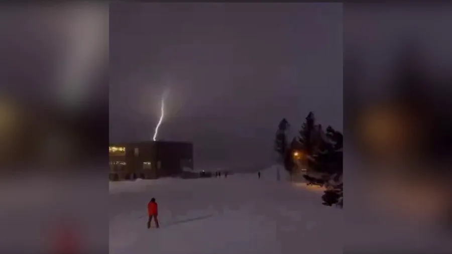 Lightning spotted as skiers ski through winter storm in Idaho