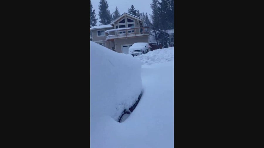 Cars buried under three feet of snow in California