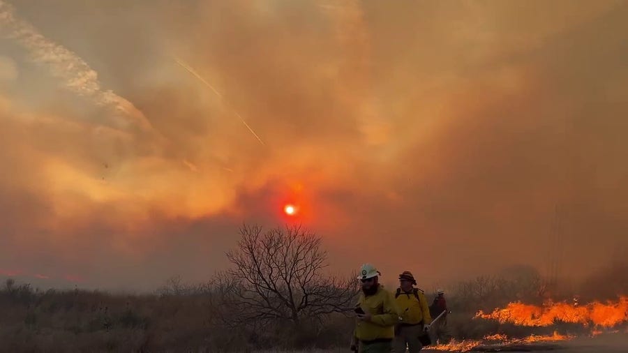 Watch: Crews work to extinguish wildfire near Sanford, Texas