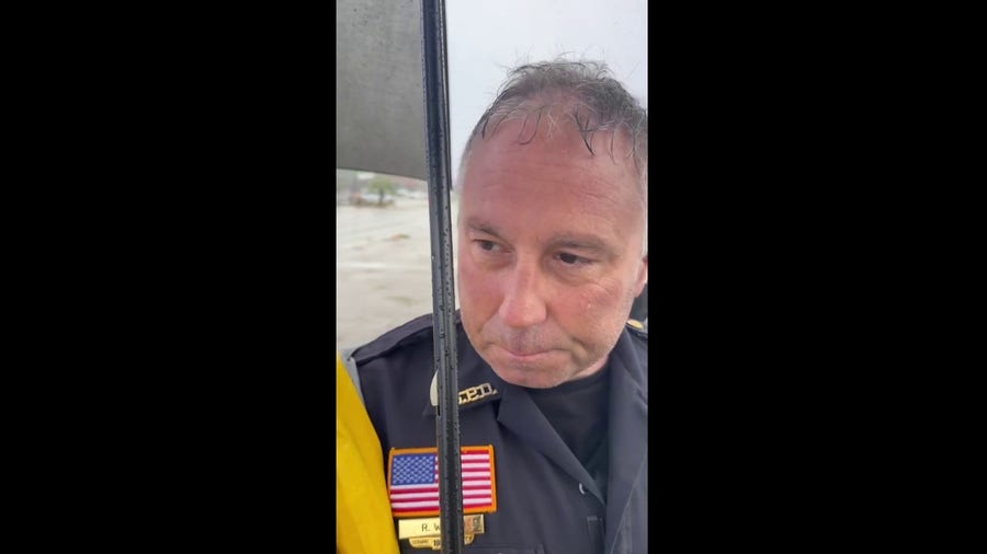Officer caught in car during tornado