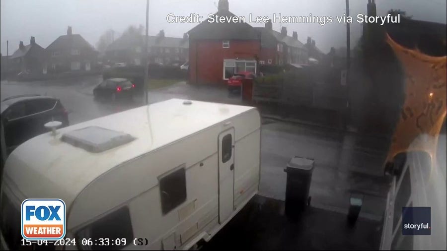 Watch wild winds flip a camper in England