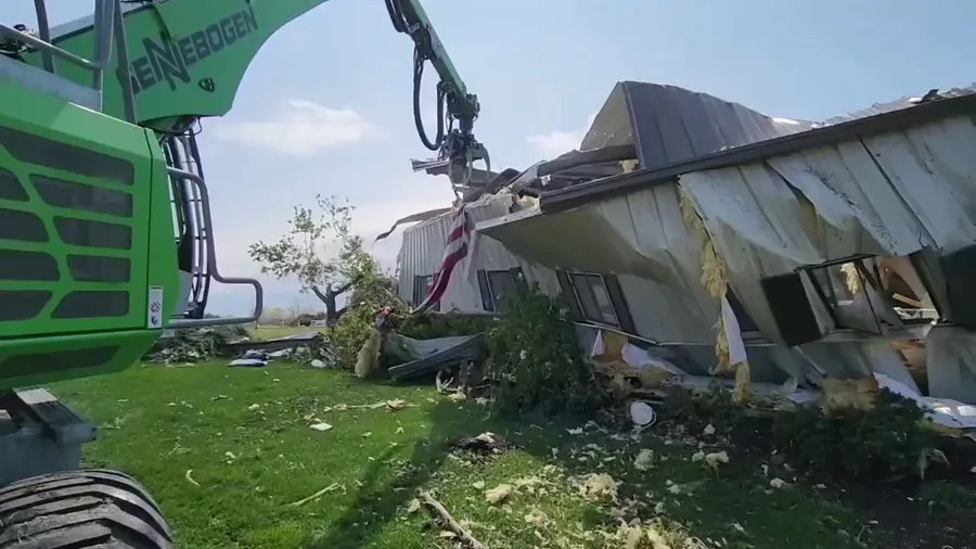 Crews pull US flag from Nebraska home destroyed by tornado