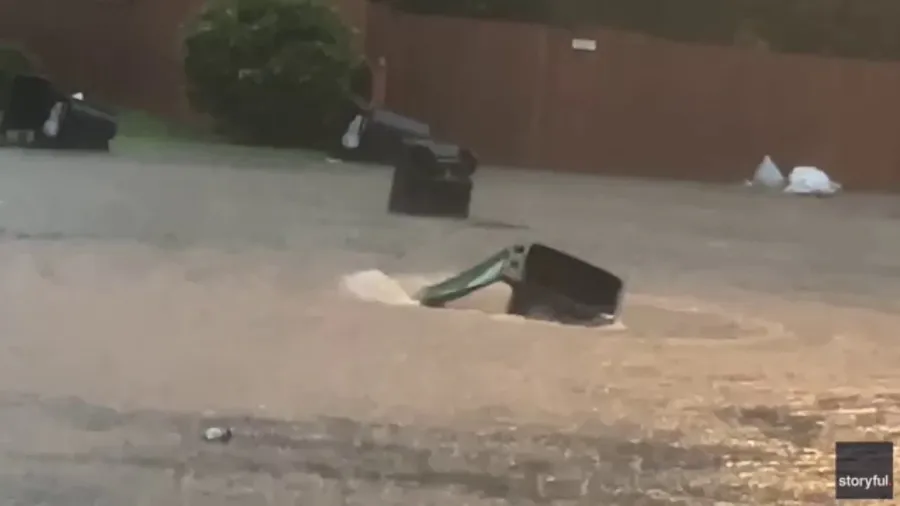Watch: Trash bin twirls gracefully on flooded Omaha, NE street