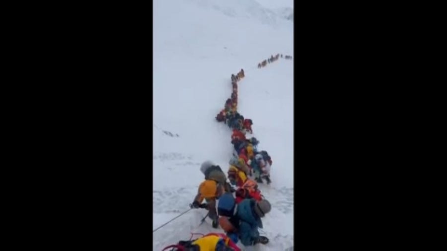 'Traffic jam' atop Mt. Everest as dozens of climbers await weather window