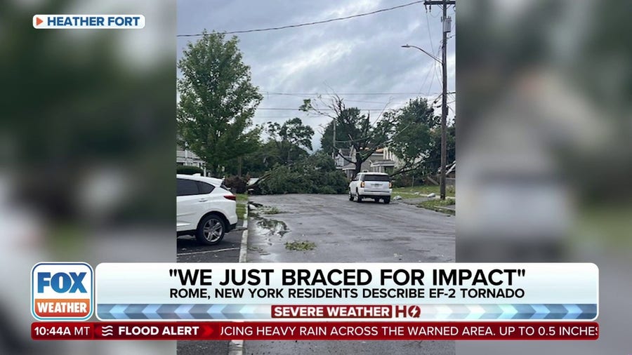 Woman shields granddaughter during Rome, New York tornado