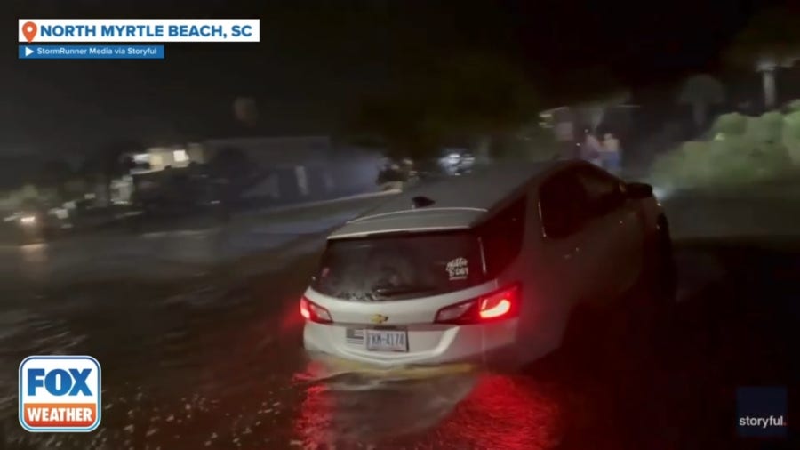 Vehicle left stranded in floodwaters as Debby lashes South Carolina