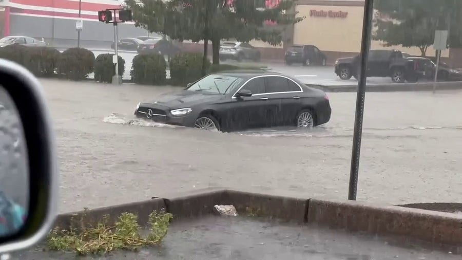 Watch: Cars attempt to drive through flooding in Connecticut