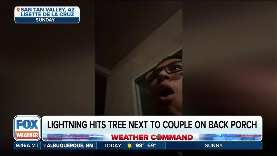 Lightning hits tree next to couple on Arizona back porch