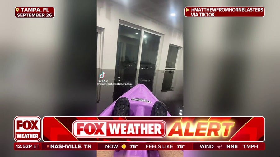 Florida man kayaks in flooded living room during Hurricane Helene