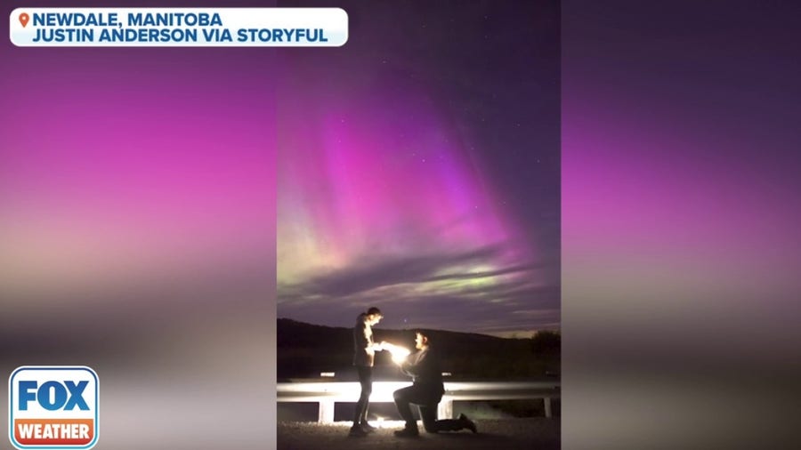 Beautiful proposal happens under dreamy aurora lights