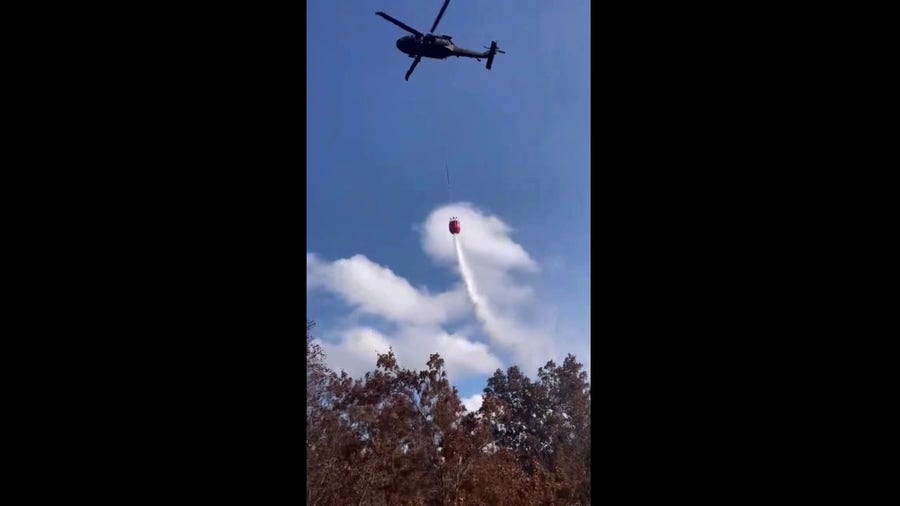 Watch: Water dumped on deadly Connecticut wildfire