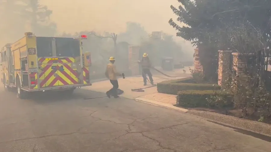 Firefighters work to contain Mountain Fire in Ventura County, Calfornia