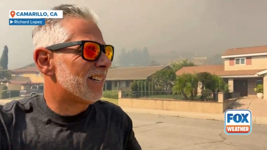 Winds whip as California homeowner documents Mountain Fire burn neighborhood