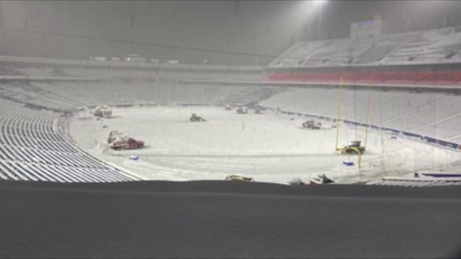 Crews work to clear heavy snow from Highmark Stadium ahead of Bills-49ers Sunday night game