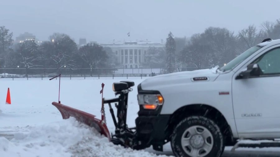 Watch: Plow clears road in front of the White House in Washington, D.C.