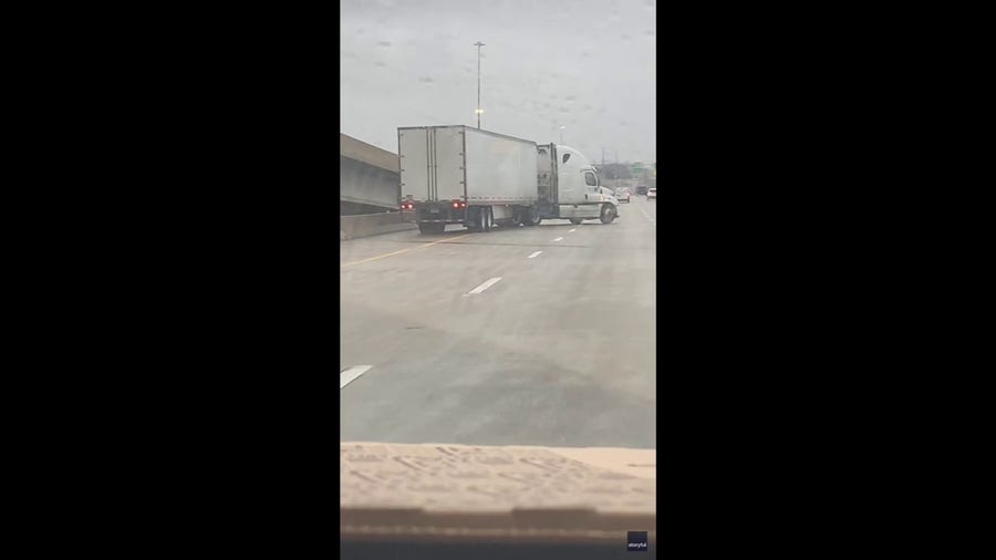 Tractor trailer jackknifes amid icy conditions in Kansas City, MO