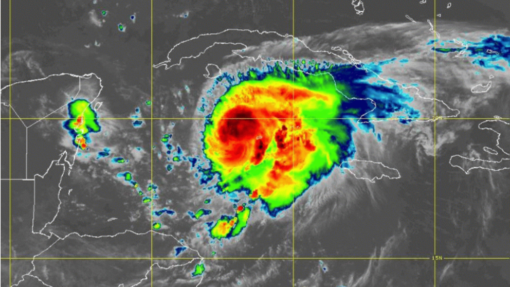 Grace intensified into a hurricane Wednesday near the Cayman Islands. 