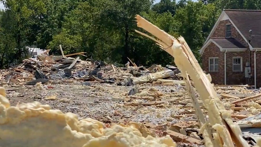 People are starting to remove tangled stacks of debris from the flash flooding last weekend. 