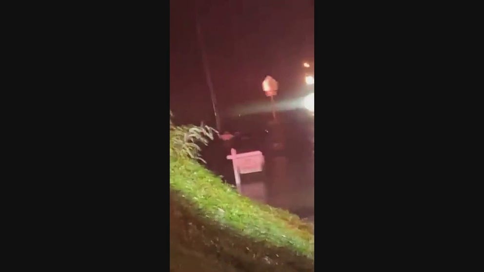 Emergency crews in Alabama help a woman who was trapped in life threatening flooding Wednesday evening.