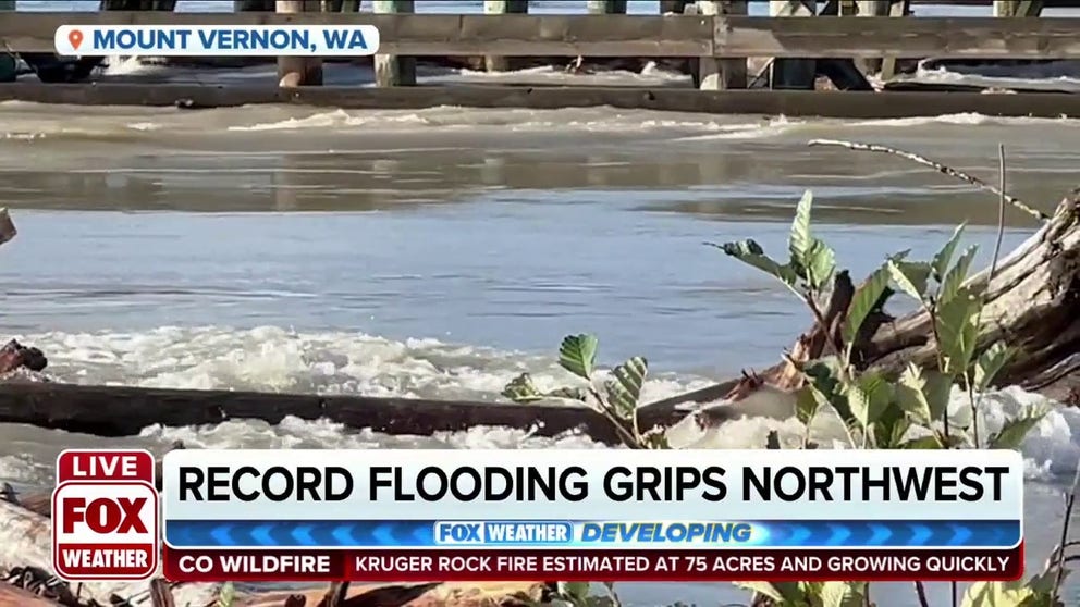 FOX Weather multimedia journalist Robert Ray talks with a resident in Mount Vernon, WA, who is witnessing the record flooding taking place in the Northwest. 