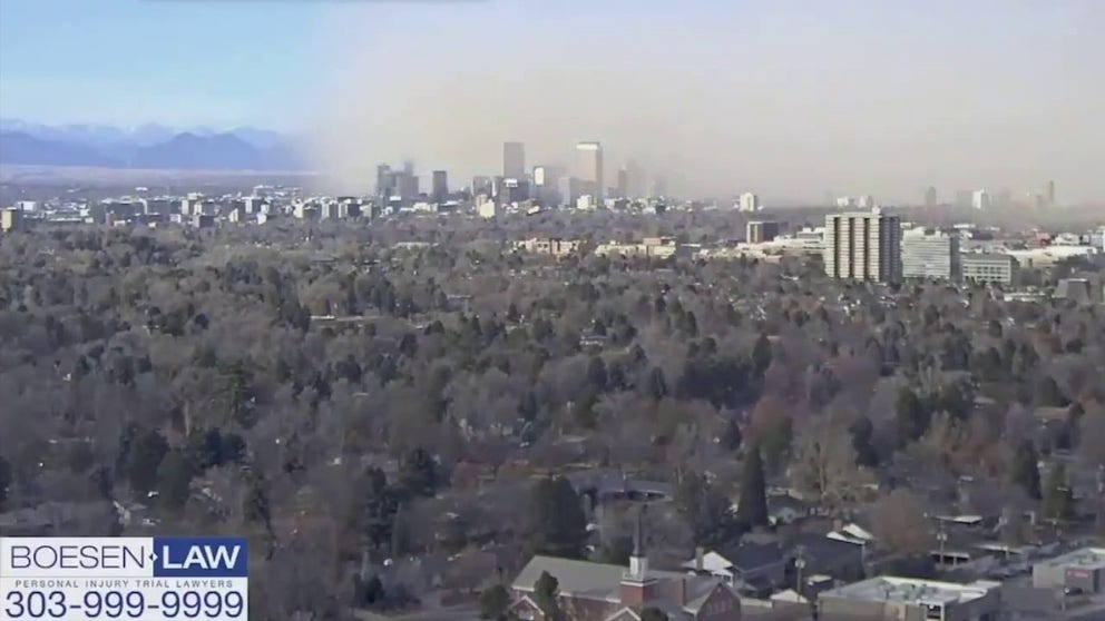 A dust cloud blew through Denver on Sunday as a cold front moved through the region.