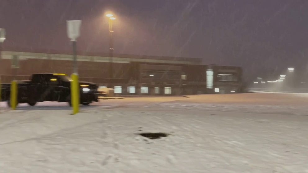 Lake effect snows fell on the State University of New York Oswego Tuesday.