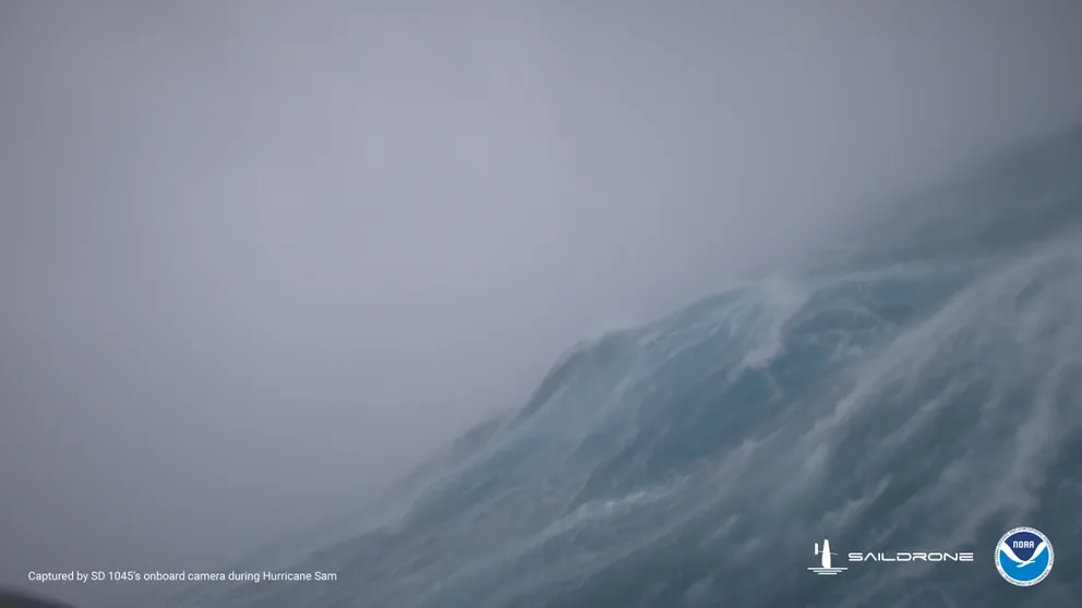 Go inside the teeth of Hurricane Sam -- a Category 4 storm from summer, 2021, on board a Saildrone as it experiences 125 mph wind and 50 foot seas. (Video courtesy: Saildrone)
