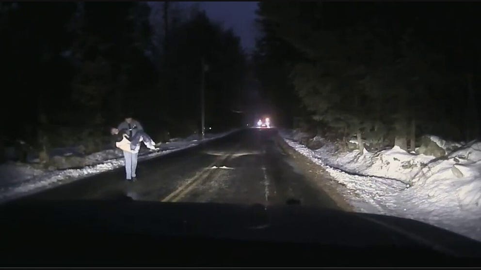 A dash camera installed in a Maine State Police cruiser captured the moment when a trooper carried a missing man to safety during a winter storm early Wednesday morning.