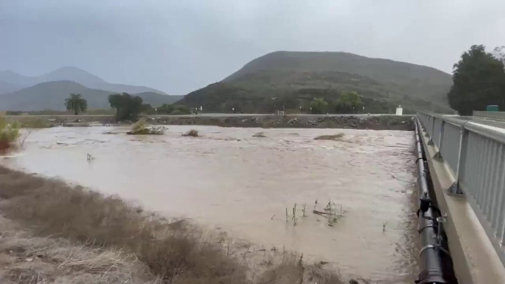 Heavy rainfall has caused a rapid rise in Calleguas Creek in Ventura County, California.