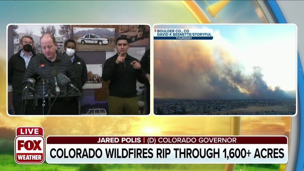 Colorado Gov. Jared Polis and Boulder officials hold a press conference amid devastating wildfires. 