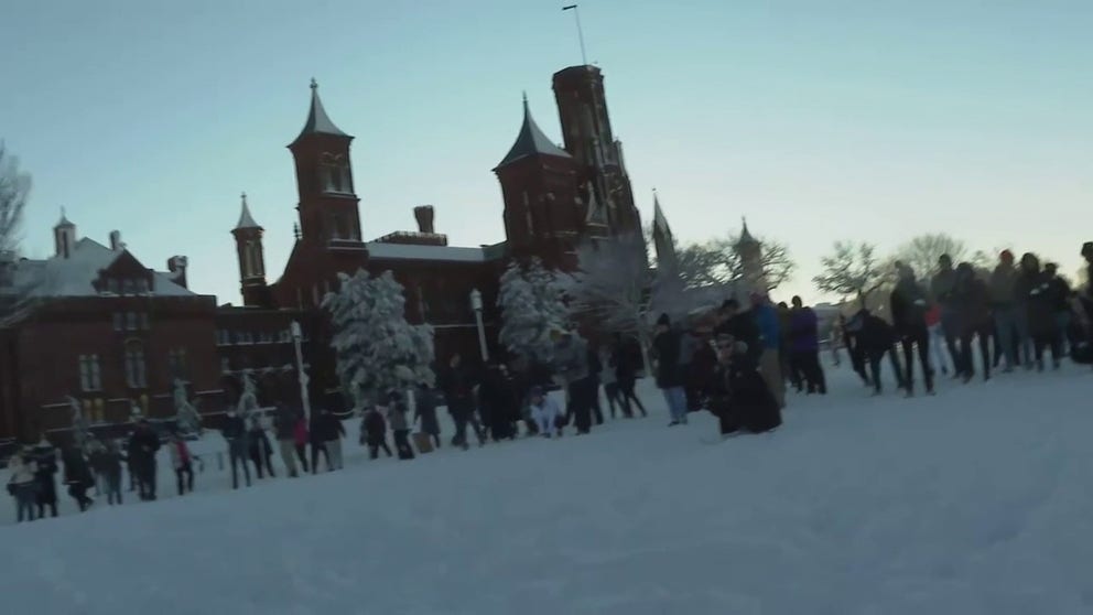 A snowball fight erupted in front of the Smithsonian Castle on the Mall in Washington, D.C. Monday.