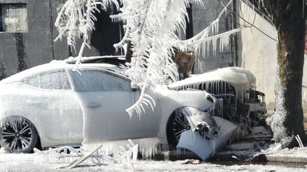 The scenes that followed a house fire were remarkable as frigid temperatures caused residual water from the firefighters' hoses to turn into sheets of ice.