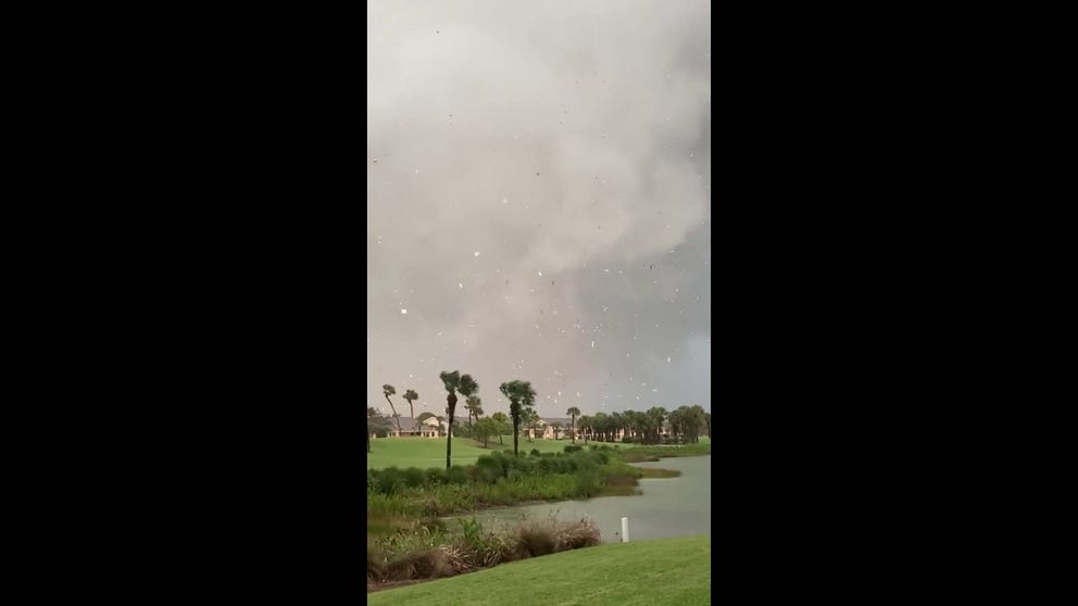 Watch as a tornado moves through Fort Myers, Florida, on Sunday. 